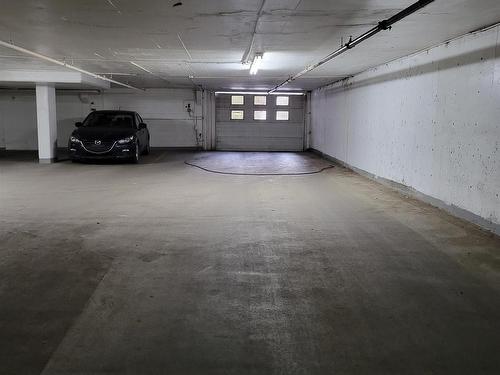 603 9028 Jasper Avenue, Edmonton, AB - Indoor Photo Showing Garage