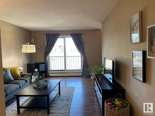 204 10939 109 Street, Edmonton, AB - Indoor Photo Showing Living Room