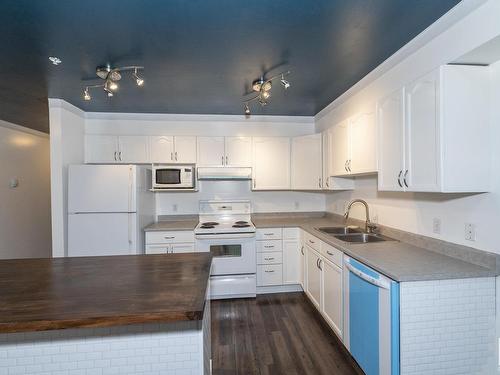 407 10311 111 Street Nw, Edmonton, AB - Indoor Photo Showing Kitchen With Double Sink