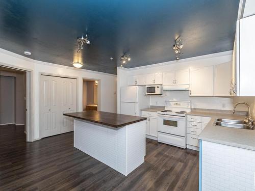 407 10311 111 Street Nw, Edmonton, AB - Indoor Photo Showing Kitchen With Double Sink