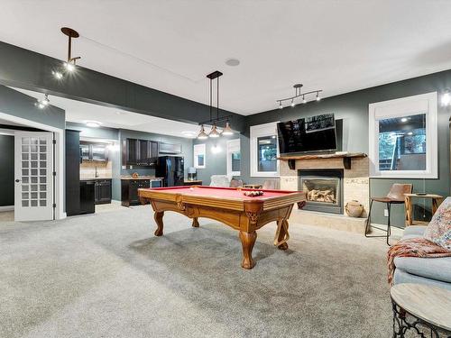 58 Greenfield Crescent, Fort Saskatchewan, AB - Indoor Photo Showing Other Room With Fireplace