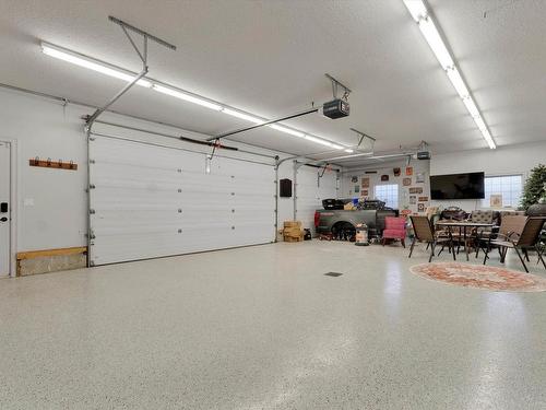 58 Greenfield Crescent, Fort Saskatchewan, AB - Indoor Photo Showing Garage