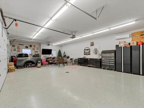 58 Greenfield Crescent, Fort Saskatchewan, AB - Indoor Photo Showing Garage