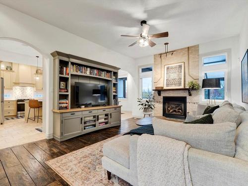 58 Greenfield Crescent, Fort Saskatchewan, AB - Indoor Photo Showing Living Room With Fireplace