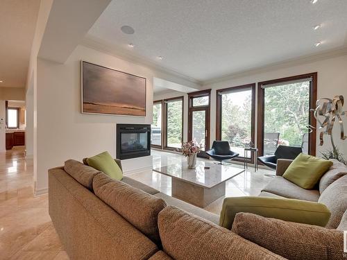 925 Hollingsworth Bend, Edmonton, AB - Indoor Photo Showing Living Room With Fireplace