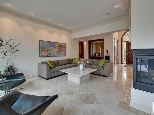 925 Hollingsworth Bend, Edmonton, AB - Indoor Photo Showing Living Room With Fireplace