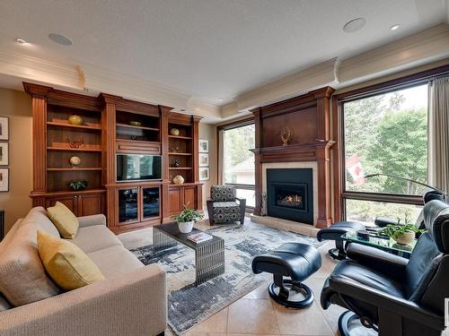 925 Hollingsworth Bend, Edmonton, AB - Indoor Photo Showing Living Room With Fireplace