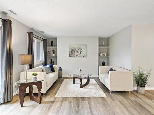 309 14810 51 Avenue, Edmonton, AB - Indoor Photo Showing Living Room