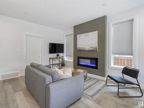 10426 126 Street, Edmonton, AB - Indoor Photo Showing Living Room With Fireplace