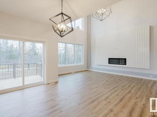 696 Astoria Way, Devon, AB - Indoor With Fireplace