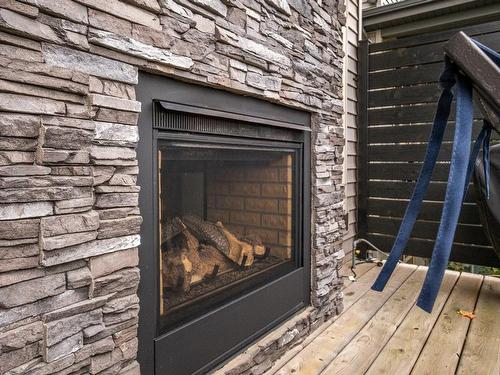 29 Garneau Gate, Spruce Grove, AB -  Photo Showing Other Room With Fireplace