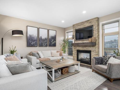 29 Garneau Gate, Spruce Grove, AB - Indoor Photo Showing Living Room With Fireplace