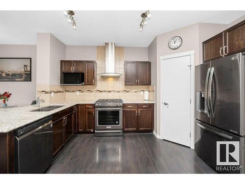 1311 29St, Edmonton, AB - Indoor Photo Showing Kitchen With Stainless Steel Kitchen With Double Sink