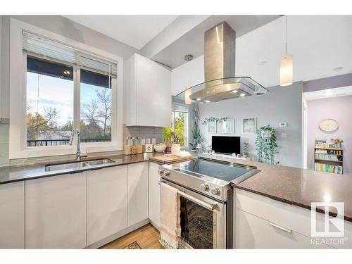 302 9907 91 Avenue, Edmonton, AB - Indoor Photo Showing Kitchen With Double Sink