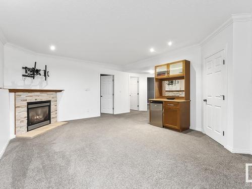 3 Evergreen Close, Cold Lake, AB - Indoor Photo Showing Living Room With Fireplace