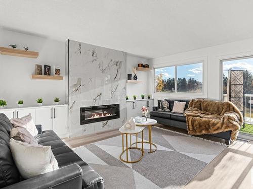 37 Royal Road, Edmonton, AB - Indoor Photo Showing Living Room With Fireplace