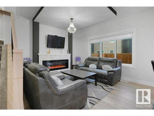 19740 28 Avenue, Edmonton, AB - Indoor Photo Showing Living Room With Fireplace