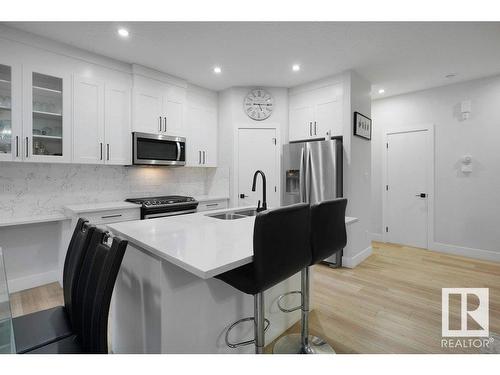 19740 28 Avenue, Edmonton, AB - Indoor Photo Showing Kitchen With Stainless Steel Kitchen With Double Sink With Upgraded Kitchen