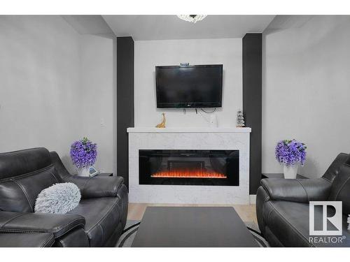 19740 28 Avenue, Edmonton, AB - Indoor Photo Showing Living Room With Fireplace