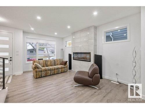 10921 150 Street, Edmonton, AB - Indoor Photo Showing Living Room With Fireplace