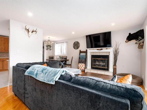 9221 84 Street, Fort Saskatchewan, AB - Indoor Photo Showing Living Room With Fireplace