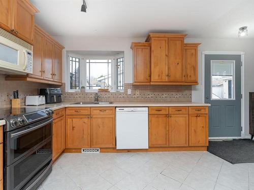 9221 84 Street, Fort Saskatchewan, AB - Indoor Photo Showing Kitchen With Double Sink