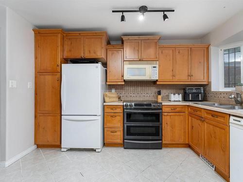 9221 84 Street, Fort Saskatchewan, AB - Indoor Photo Showing Kitchen With Double Sink