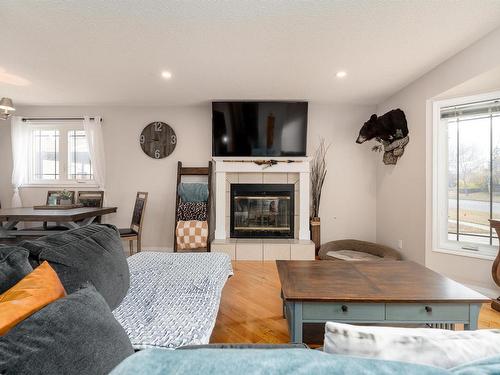 9221 84 Street, Fort Saskatchewan, AB - Indoor Photo Showing Living Room With Fireplace