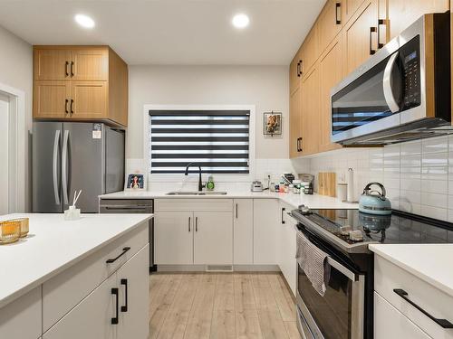 1111 Keswick Drive, Edmonton, AB - Indoor Photo Showing Kitchen With Stainless Steel Kitchen With Double Sink With Upgraded Kitchen