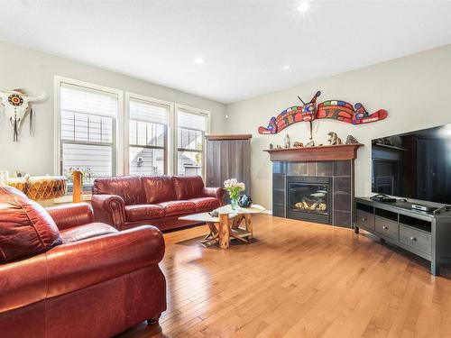 2216 Stan Waters Avenue, Edmonton, AB - Indoor Photo Showing Living Room With Fireplace