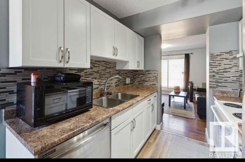 141 3308 113 Avenue, Edmonton, AB - Indoor Photo Showing Kitchen With Double Sink