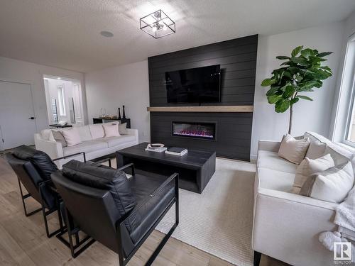 20412 128 Avenue, Edmonton, AB - Indoor Photo Showing Living Room With Fireplace