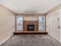 48 1904 48 Street, Edmonton, AB  - Indoor Photo Showing Living Room With Fireplace 