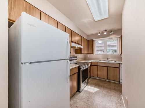 48 1904 48 Street, Edmonton, AB - Indoor Photo Showing Kitchen With Double Sink