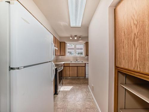 48 1904 48 Street, Edmonton, AB - Indoor Photo Showing Kitchen With Double Sink