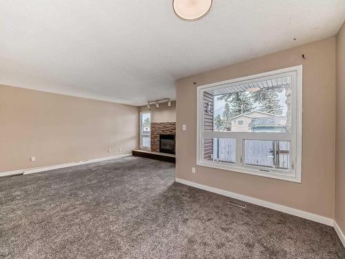 48 1904 48 Street, Edmonton, AB - Indoor Photo Showing Other Room With Fireplace