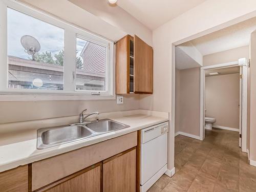 48 1904 48 Street, Edmonton, AB - Indoor Photo Showing Kitchen With Double Sink