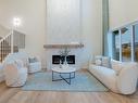 435 29 Street, Edmonton, AB  - Indoor Photo Showing Living Room With Fireplace 