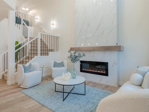 435 29 Street, Edmonton, AB - Indoor Photo Showing Living Room With Fireplace