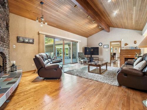 1040 50242 Rge Road 244 A, Rural Leduc County, AB - Indoor Photo Showing Living Room With Fireplace