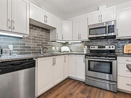 206 8515 99 Street, Edmonton, AB - Indoor Photo Showing Kitchen With Stainless Steel Kitchen With Upgraded Kitchen