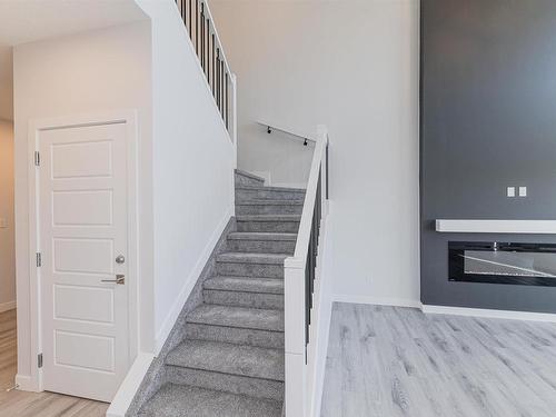 101 Edgefield Way, St. Albert, AB - Indoor Photo Showing Other Room With Fireplace