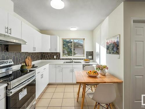 1839 Mill Woods E, Edmonton, AB - Indoor Photo Showing Kitchen With Double Sink