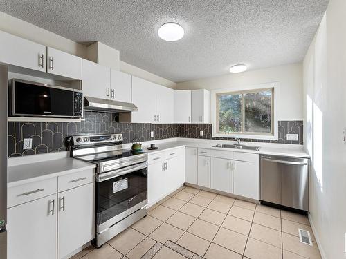 1839 Mill Woods E, Edmonton, AB - Indoor Photo Showing Kitchen With Double Sink