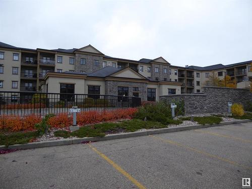 201 160 Magrath Road Nw, Edmonton, AB - Outdoor With Balcony With Facade