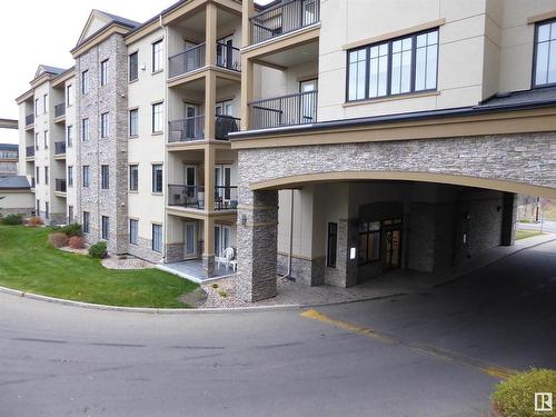 201 160 Magrath Road Nw, Edmonton, AB - Outdoor With Balcony With Facade