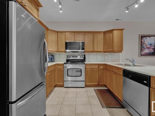 416 160 Magrath Road, Edmonton, AB - Indoor Photo Showing Kitchen With Double Sink