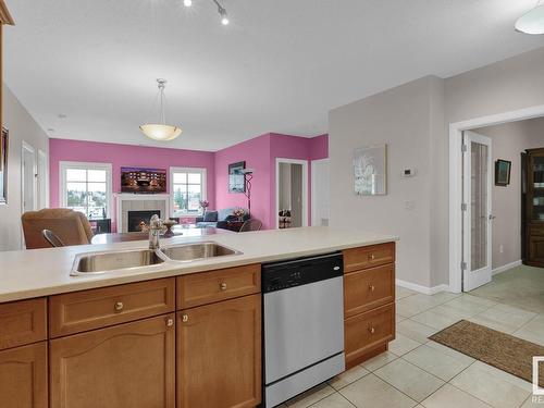 416 160 Magrath Road, Edmonton, AB - Indoor Photo Showing Kitchen With Double Sink