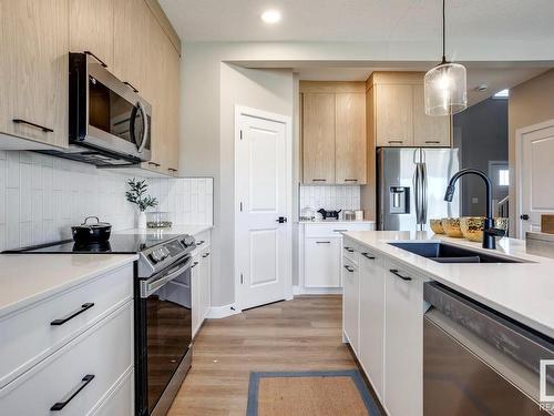 29 Waverly Way, Fort Saskatchewan, AB - Indoor Photo Showing Kitchen With Double Sink With Upgraded Kitchen