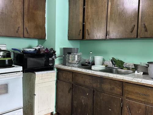 11128 95A Street, Edmonton, AB - Indoor Photo Showing Kitchen With Double Sink